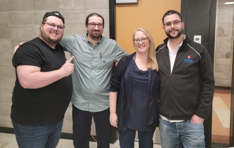 4 membres de l'UAP souriant